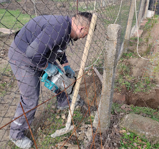 Halil working to get the drainage in