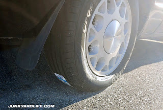 16-inch alloy wheels on Thunderbird. This one wears one new tire.