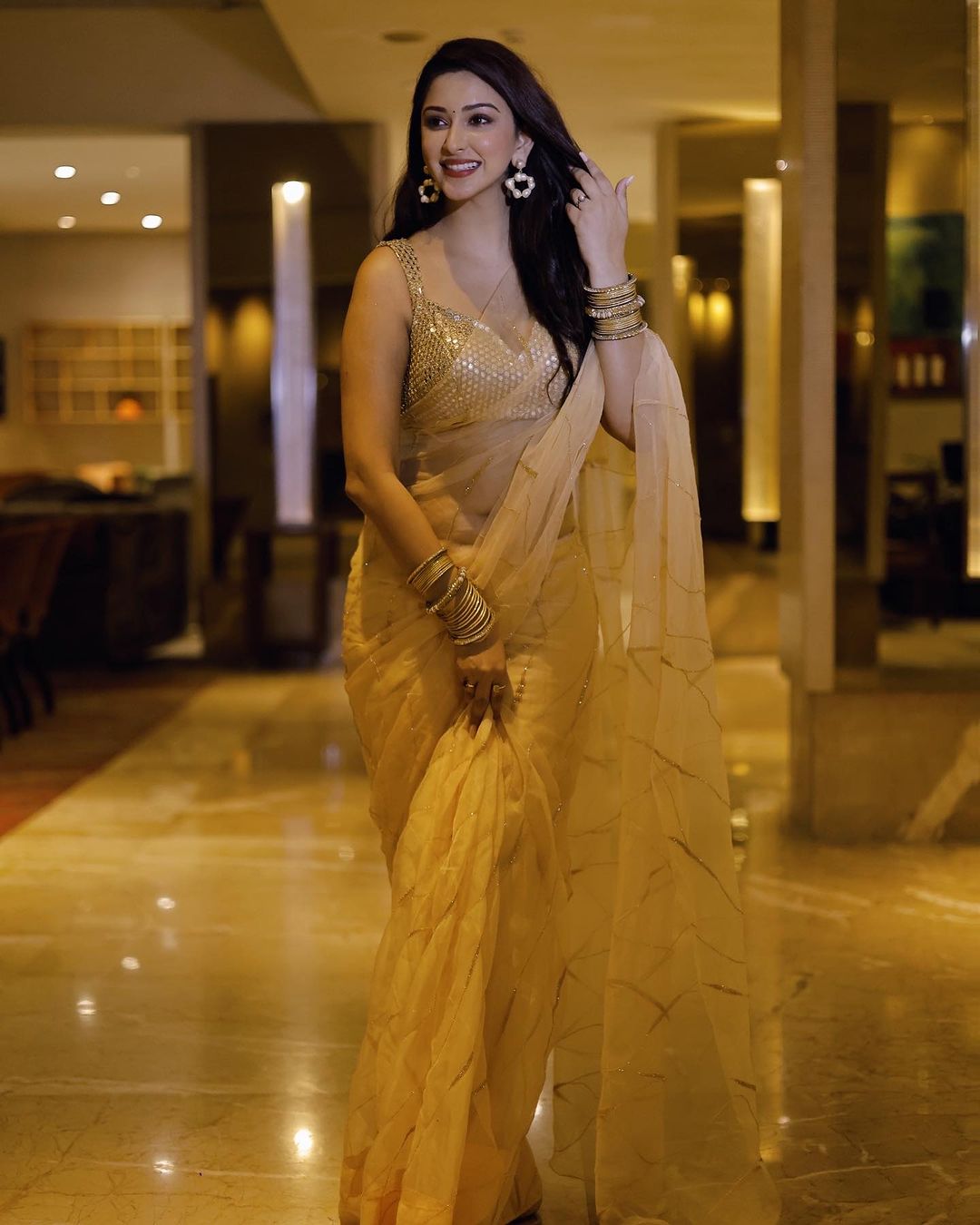 Eshanya Maheshwari's Golden Sheer Saree for Ganesh Chaturthi