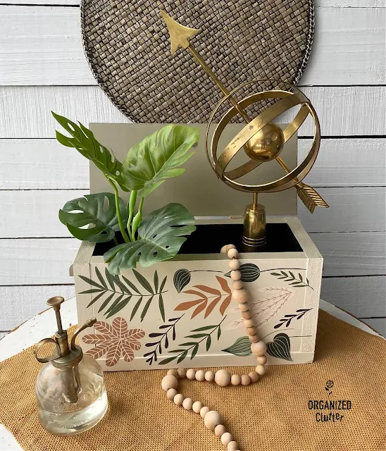 Photo of a thrifted wooden box upcycled with Dixie Belle Chalk Dried Sage and Drop Cloth Paint and Redesign with Prima Greenery House Decor Transfer.