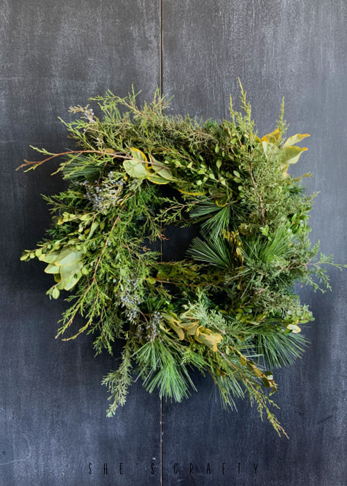 How to dress up a plain evergreen wreath.