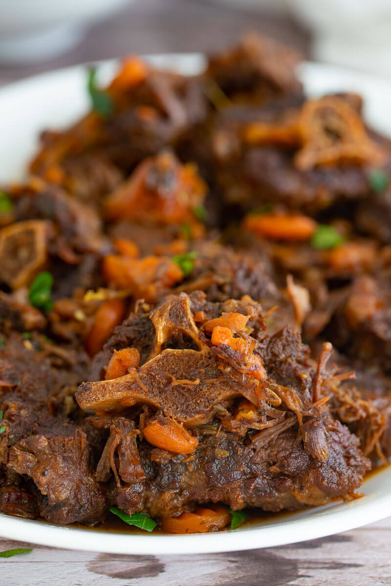 Close up picture of a piece of Trinidad stew oxtail.