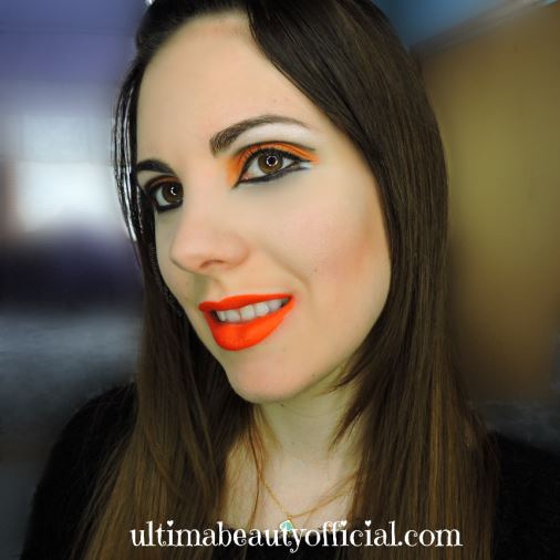 Ultima Beauty wearing Cincinnati Bengals colored makeup, opened eyes