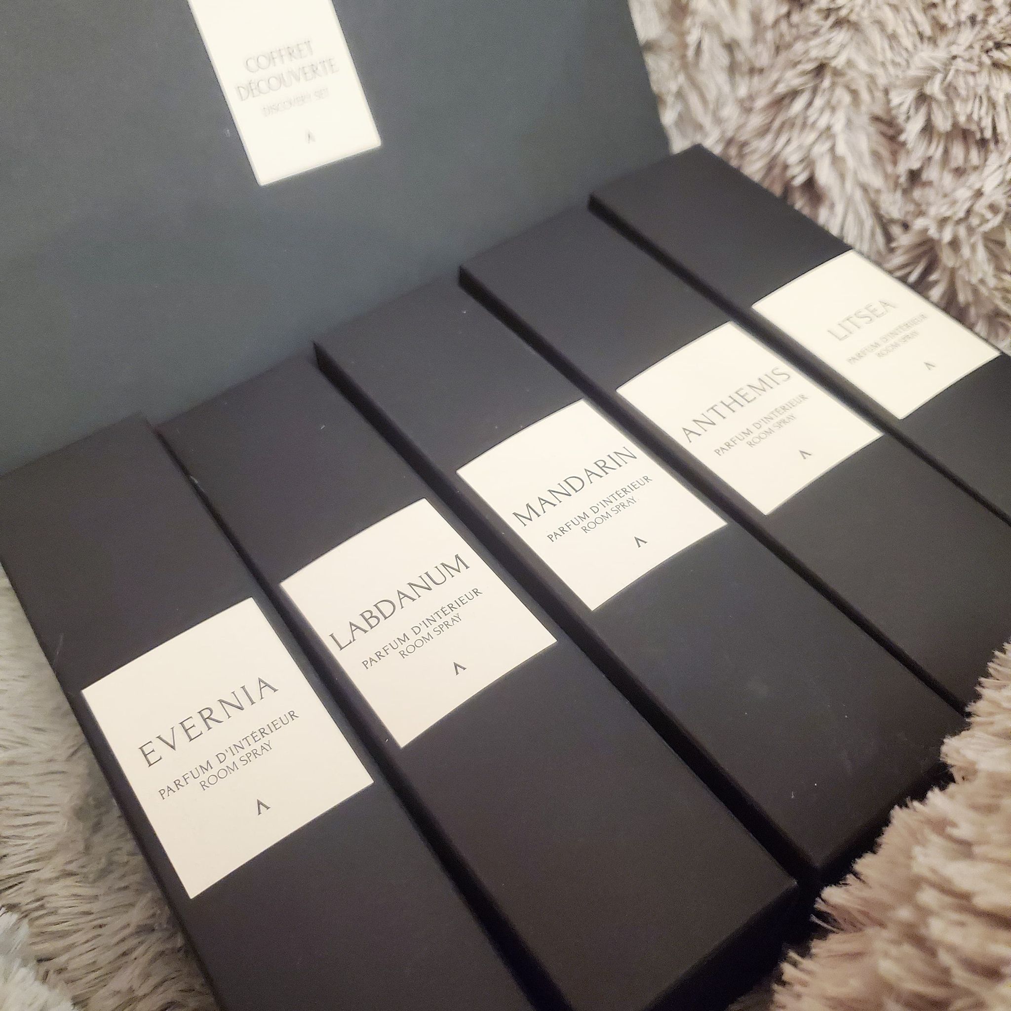 a lineup of sleek aromatherapy room spray boxes from Maison Von