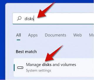 Type disks and volumes and select manage disks and volumes