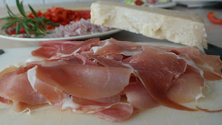 Parma is famous for Prosciutto di Parma and Parmigiano-Reggiano cheese