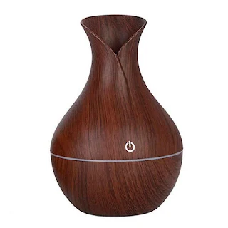 The ultra-quiet portable ultrasonic humidifier keeps your living space clean and properly moisturized Deep Wood grain hown - store