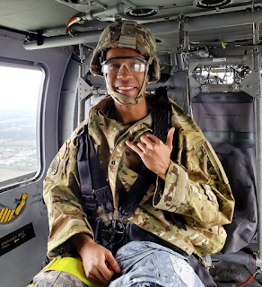 2nd Lt. Hillery flying in a Blackhawk as part of the Bushmaster   field exercise at USU. (Photo credit: Courtesy of Army 2nd Lt.   Brandon Hillery, USU)