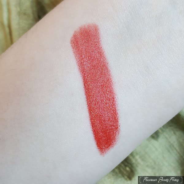 swatch of Givenchy Le Rouge Lunar New Year, Marble Edition lipstick on pale arm