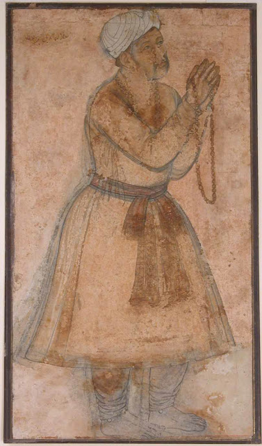 Akbar praying