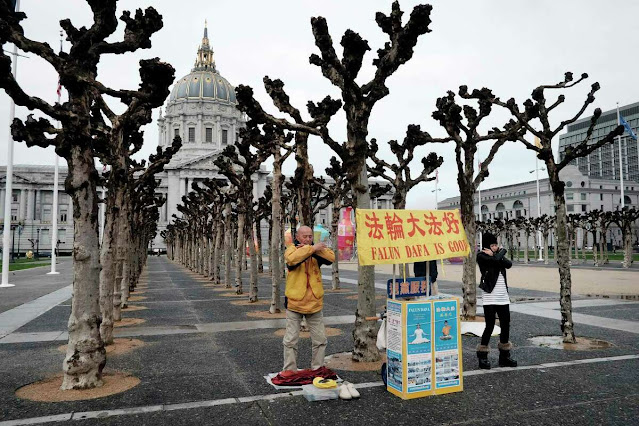 People practice Falun Gong at Civic Center Plaza in San Francisco on Feb. 10, 2017. On Friday, the Ninth Circuit ruled that a Falun Gong organizer who fled China for California was eligible for political asylum.