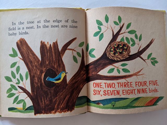 picture of children's book pages with tree illustration
