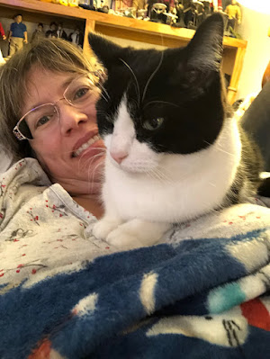 woman and cat on couch