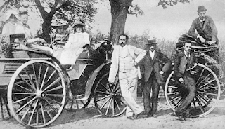 Karl Friedrich Benz in Black and white colour with one of his ever made cars