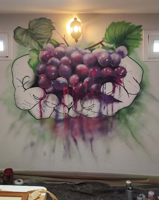 Graffiti Barcelona uvas manos artesanas vino