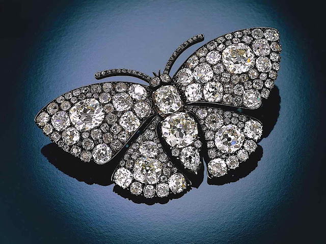 a Lalique broach, butterfly with diamonds