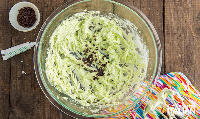 mint frosting in a glass bowl