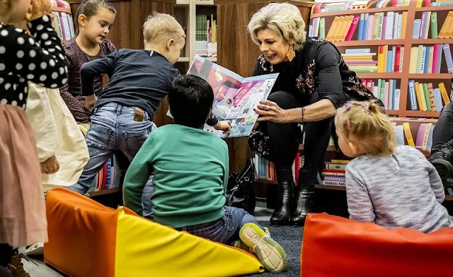 Princess Laurentien wore a metallic bronze sequin embroidered black coat by Walleska Ecochicc