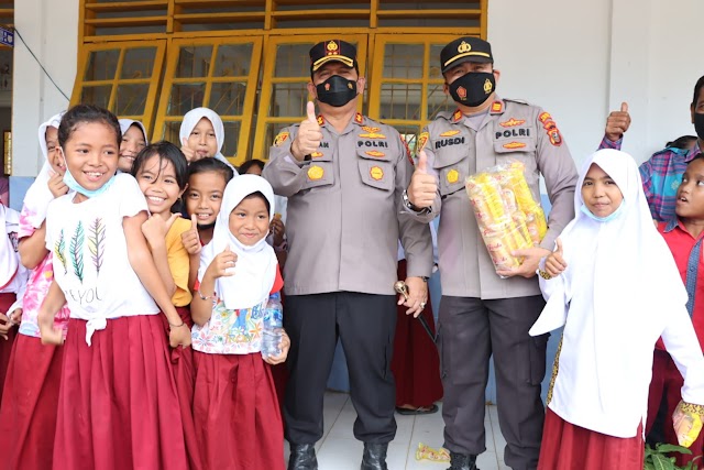 KAPOLRES BATU BARA MELAKUKAN PENGECEKAN VAKSINASI ANAK USIA 6-11 TAHUN DI SD NEGERI 17 DESA SIMPANG GAMBUS