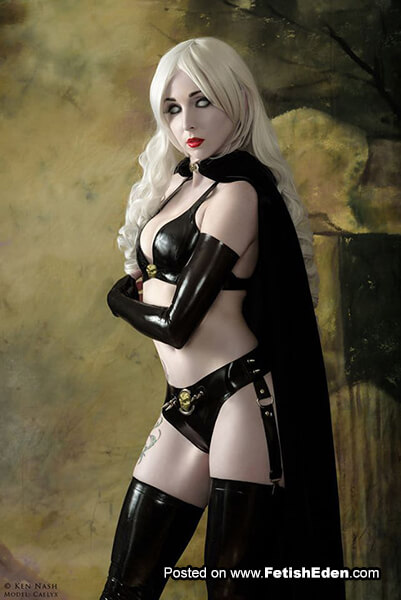 Lady Death cosplay with hot blonde in long black latex gloves and black latex stockings