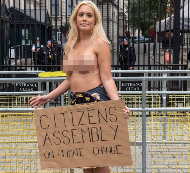 Topless climate change protester says she 'won't eat' until Boris Johnson gives in to climate change demands