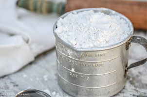 measuring cup with flour