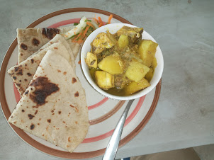 Fijian Chicken curry/ Roti.