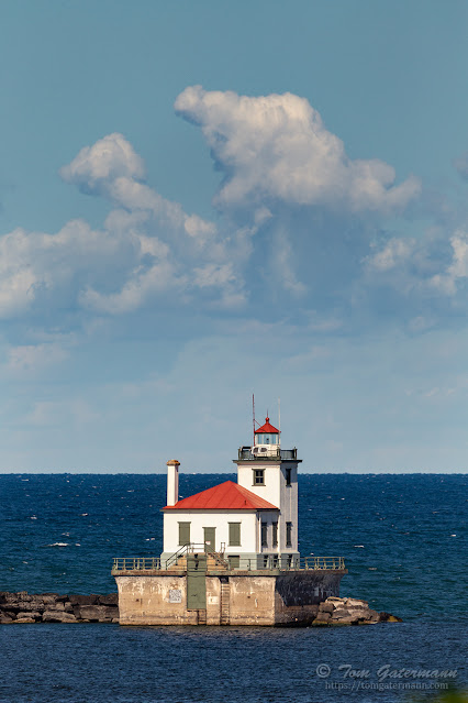 A view of West Pierhead Lighthouse from the bluff at Fort Ontario