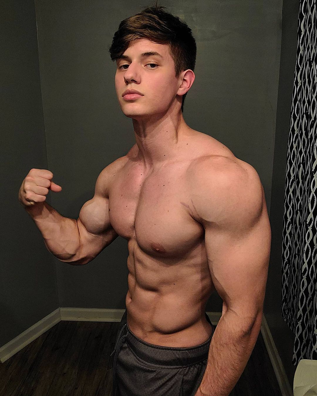 strong-young-guy-flexing-biceps-sexy-shirtless-muscle-body-luis-hernandez