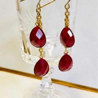 red linear earrings