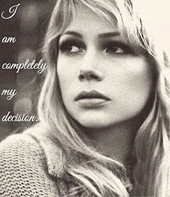 A young Michelle Williams looking sad and bored with the caption I am completely my decision