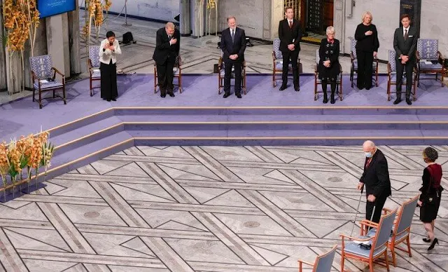 King Harald, Queen Sonja and Crown Prince Haakon attended the 2021 Nobel Peace Prize ceremony at Oslo City Hall