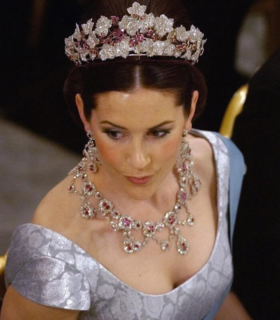Crown Princess Mary wears the Danish Ruby Tiara set of jewelry. Lasse Spangenberg dress. Graphic artist Claus Due and Franne Voigt