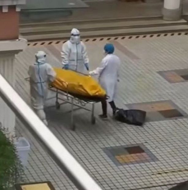 Covid patient in a body bag comes back to life just before being cremated after 'dying'