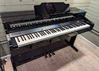 Williams Overture III polished ebony piano cabinet