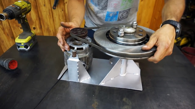 A brake disc grinder from a washing machine motor