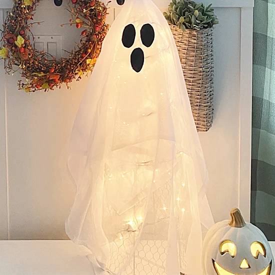 ghost with lights and wreath