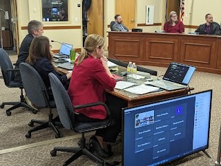 Hellen and Ahern (with Miriam Goodman in the middle) presenting to the Joint Budget Subcommittee March 10, 2022