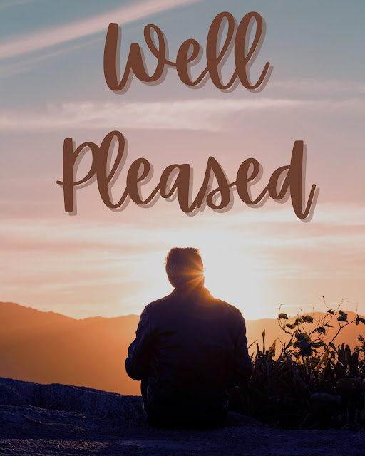 Person sitting on top of a mountain at sunrise, with words “Well Pleased”