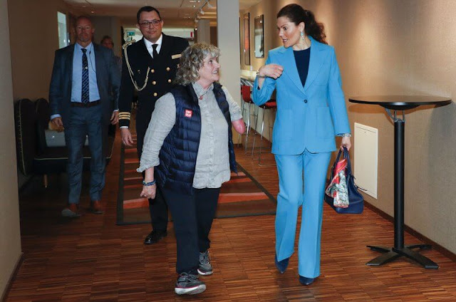 Crown Princess Victoria wore a blue wool blend suit, jacket and trousers from H&M. Blue earrings by Dulong