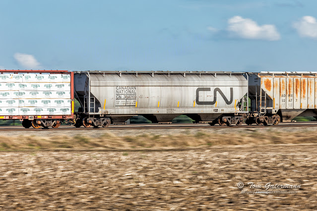 A panning capture of covered hopper CN388769