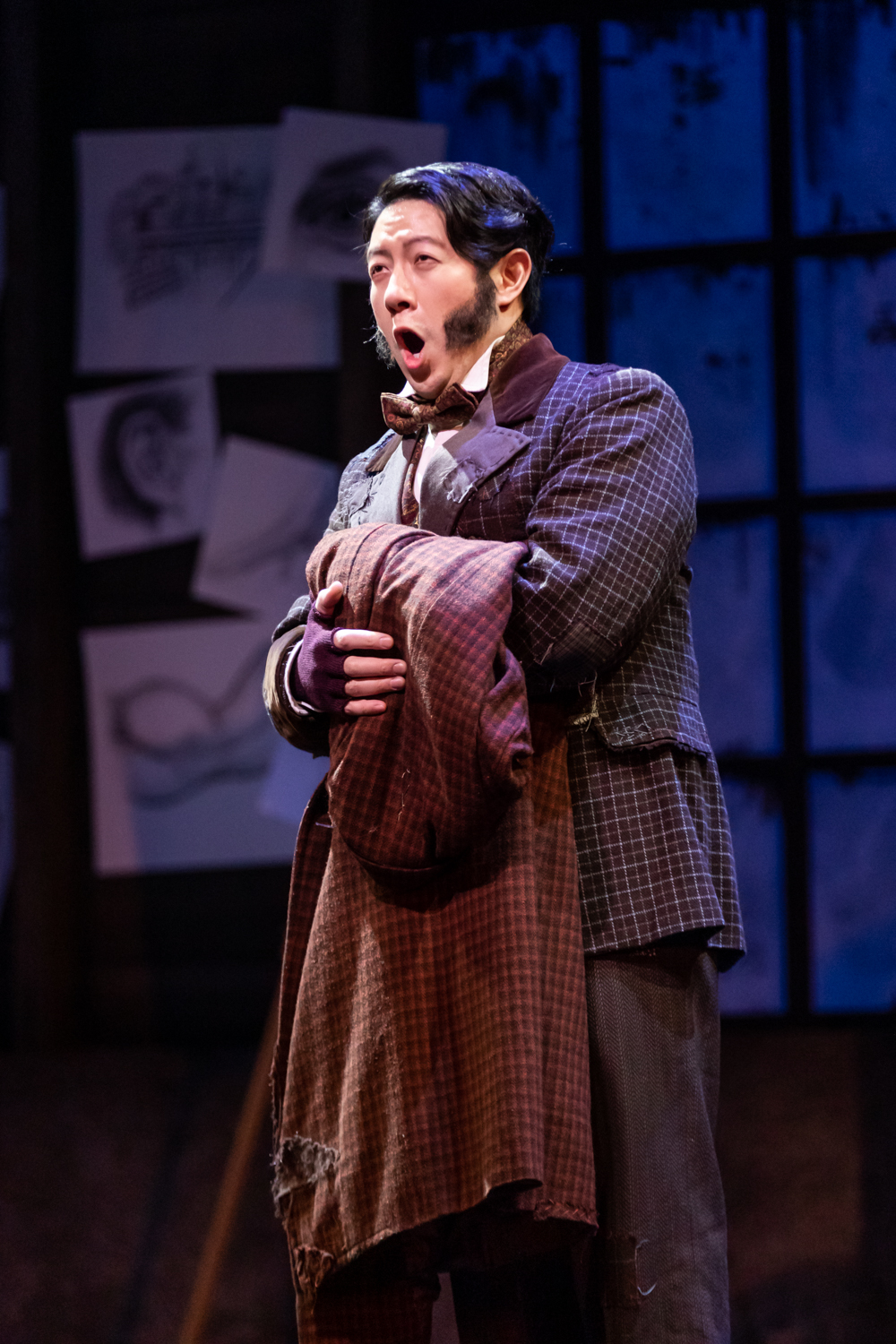 IN REVIEW: bass ADAM LAU as Colline in North Carolina Opera's January 2022 production of Giacomo Puccini's LA BOHÈME [Photograph © by Eric Waters Photography]