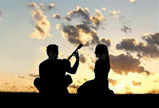 Man Singing on Guitar