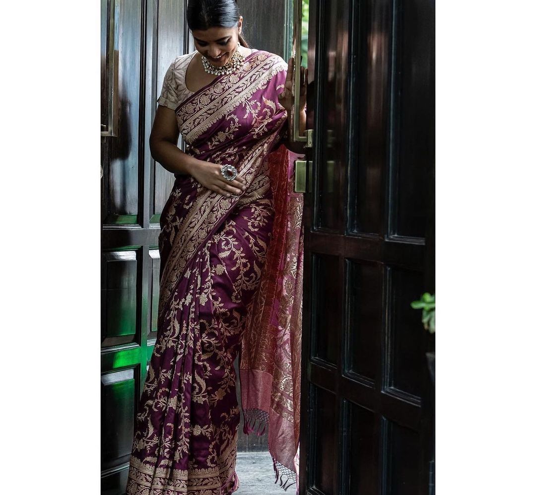 Beautiful actress Aishwarya Rajesh in purple banarsi saree