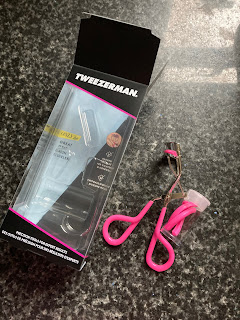 Packaging and Tweezerman Eyelash Curler