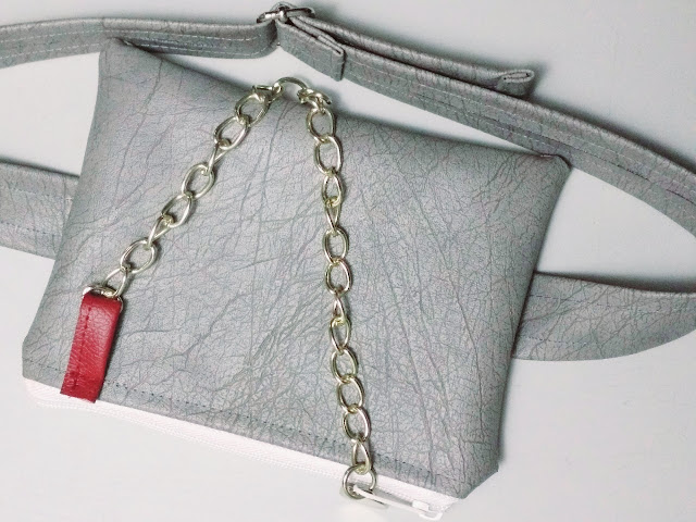 Grey Faux leather hip bag with decorative chain