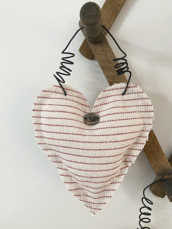 hanging heart with rebar wire and button