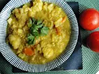 Lentil Curry Soup in a bowl on a table.