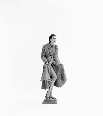 fashion model Barbara Mullen in 1951 against all white studio backdrop