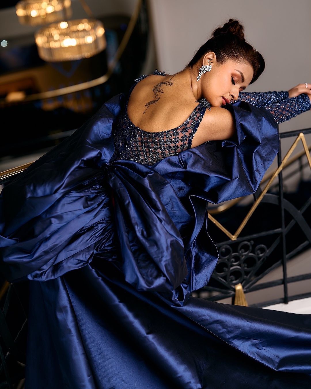 Avneet Kaur Stuns in a Plunging Neckline Blue Shimmery Mini Dress at Cannes 2024